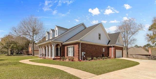 401 Gladstone Way, Dothan, AL 36303 - view of home's exterior with brick siding, driveway, a garage, and covered porch