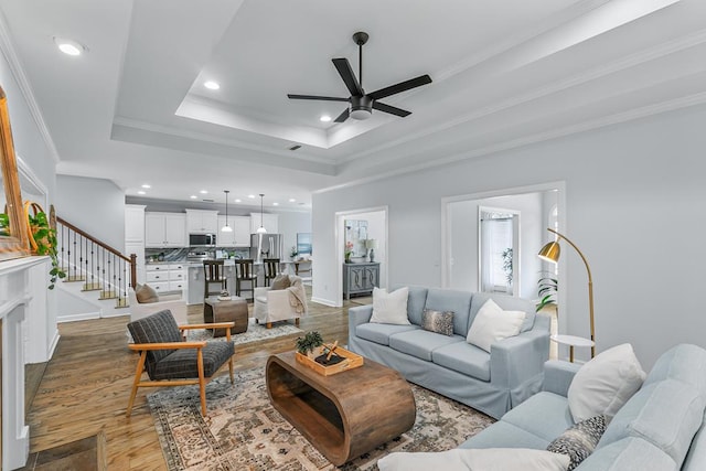 401 Gladstone Way, Dothan, AL 36303 - living area with a ceiling fan, wood finished floors, recessed lighting, a tray ceiling, and ornamental molding