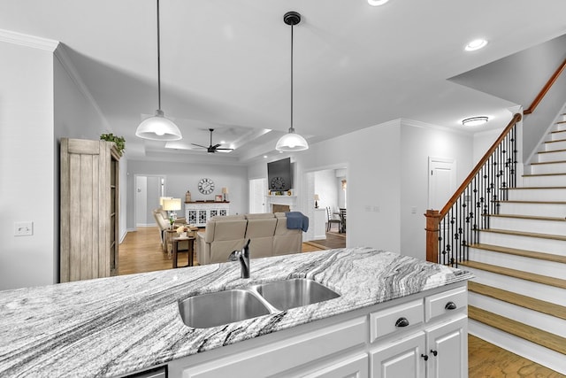 401 Gladstone Way, Dothan, AL 36303 - kitchen featuring crown molding, white cabinets, recessed lighting, ceiling fan, and light stone counters