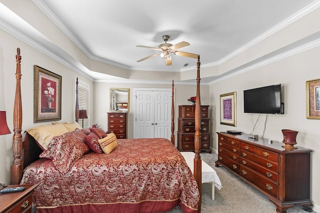 409 Drake Dr, Dothan, AL 36605 - carpeted bedroom featuring ornamental molding, ceiling fan, a closet, and a tray ceiling