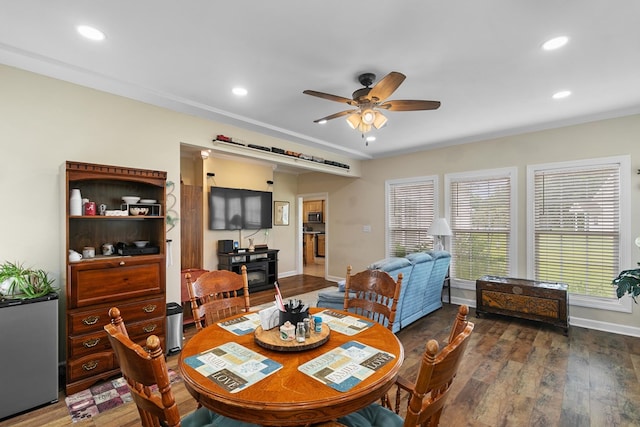 409 Drake Dr, Dothan, AL 36605 - dining space with ceiling fan, wood finished floors, recessed lighting, a wood stove, and ornamental molding