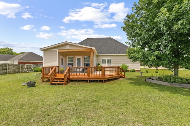 409 Drake Dr, Dothan, AL 36605 - back of property with a deck and roof with shingles