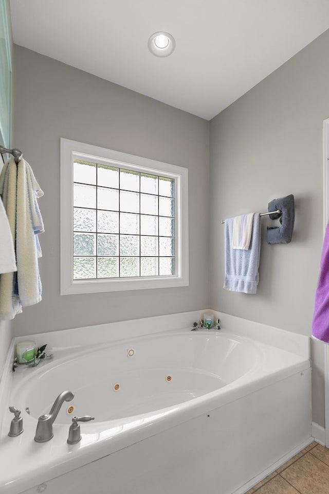 409 Drake Dr, Dothan, AL 36605 - bathroom with a jetted tub, tile patterned floors, and recessed lighting