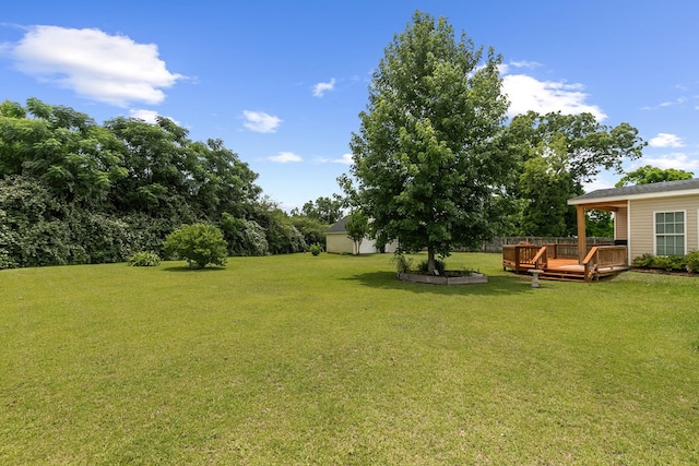 409 Drake Dr, Dothan, AL 36605 - view of green lawn featuring a wooden deck