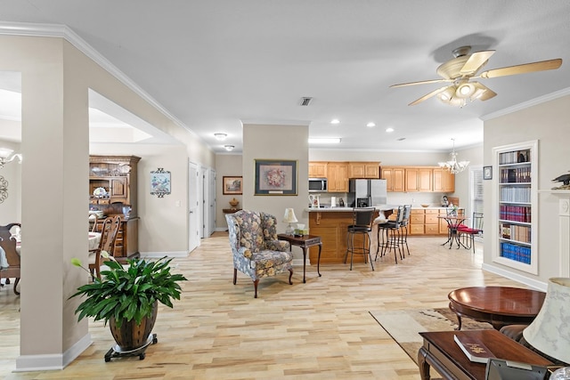 409 Drake Dr, Dothan, AL 36605 - living room with a chandelier, a ceiling fan, light wood finished floors, recessed lighting, and crown molding