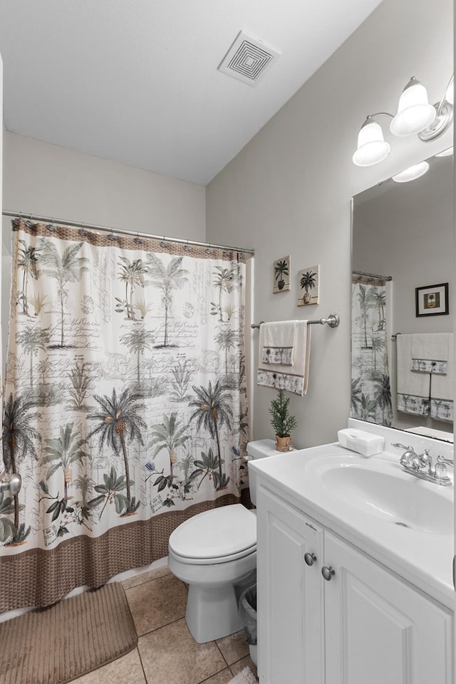 409 Drake Dr, Dothan, AL 36605 - bathroom featuring vanity, tile patterned flooring, and a shower with curtain