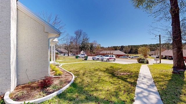 180 Fairway Woods Dr, Ozark, AL 36360 - view of grassy yard featuring a residential view