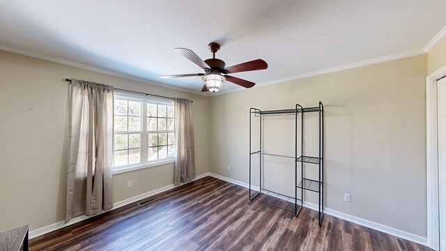 180 Fairway Woods Dr, Ozark, AL 36360 - unfurnished bedroom with crown molding, dark wood-style floors, baseboards, and a ceiling fan
