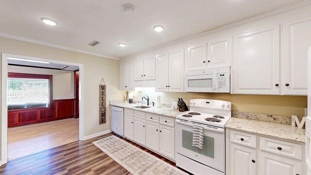 180 Fairway Woods Dr, Ozark, AL 36360 - kitchen featuring white appliances, a sink, dark wood-style floors, white cabinetry, and ornamental molding