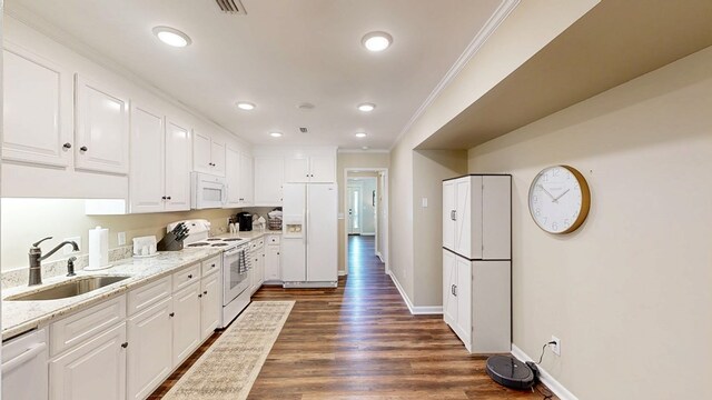 180 Fairway Woods Dr, Ozark, AL 36360 - kitchen featuring white appliances, a sink, white cabinetry, crown molding, and light stone countertops