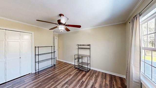 180 Fairway Woods Dr, Ozark, AL 36360 - unfurnished bedroom with dark wood-style floors, baseboards, crown molding, a closet, and ceiling fan