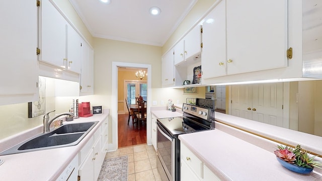 kitchen with sink, light tile patterned floors, crown molding, electric stove, and white cabinets