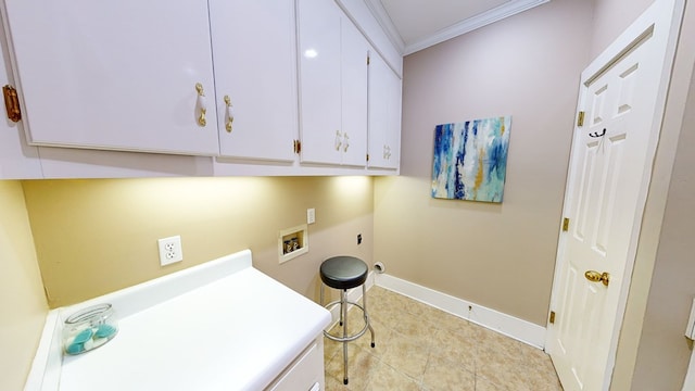 clothes washing area with cabinets, hookup for an electric dryer, hookup for a washing machine, light tile patterned floors, and ornamental molding