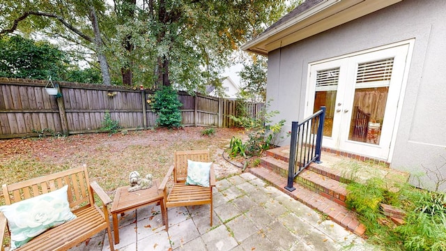 view of patio featuring french doors