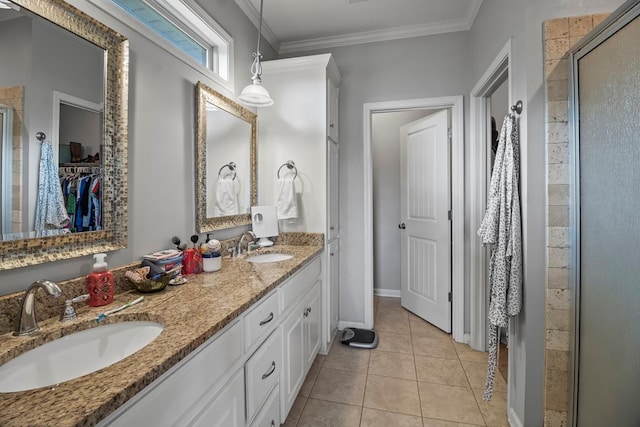 118 Brookstone Ct, Headland, AL 36345 - bathroom featuring a sink, a spacious closet, and a shower stall
