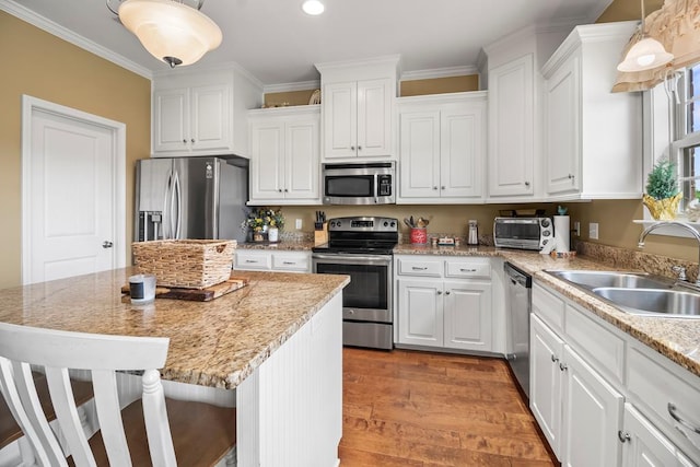 118 Brookstone Ct, Headland, AL 36345 - kitchen with a sink, white cabinetry, and appliances with stainless steel finishes