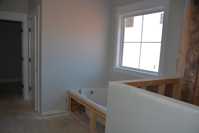 bathroom featuring a tub