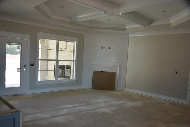 unfurnished living room with beamed ceiling, a large fireplace, crown molding, and coffered ceiling