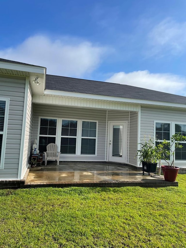 70 Beckett Ln, Newton, AL 36352 - back of house featuring a lawn and a patio