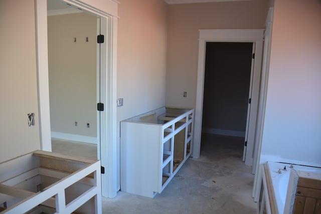 bathroom featuring concrete floors