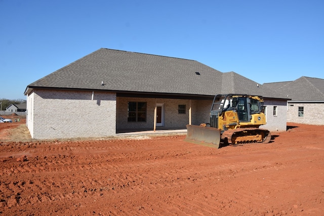 rear view of house featuring a patio