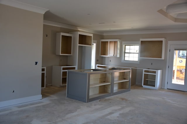 kitchen featuring a center island and ornamental molding