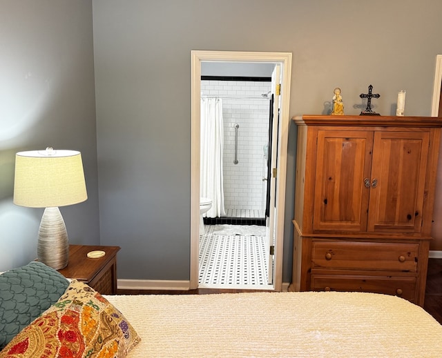 117 Lawrenceburg Ct, Dothan, AL 36305 - bedroom featuring baseboards and connected bathroom