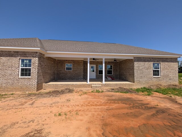 12611 Fortner St, Newton, AL 36352 - view of front of property with brick siding, a ceiling fan, and a patio