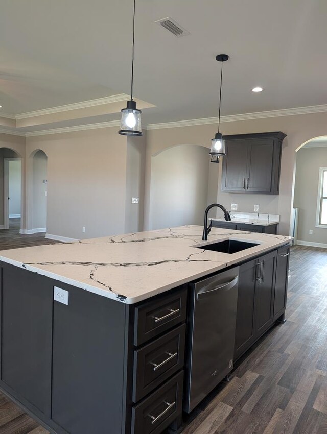 12611 Fortner St, Newton, AL 36352 - kitchen with arched walkways, dishwasher, a center island with sink, ornamental molding, and a sink