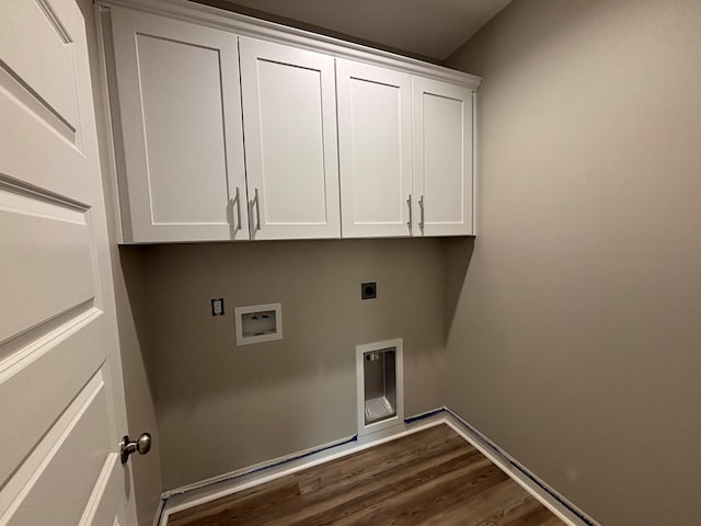 clothes washing area with dark hardwood / wood-style floors, cabinets, washer hookup, and hookup for an electric dryer