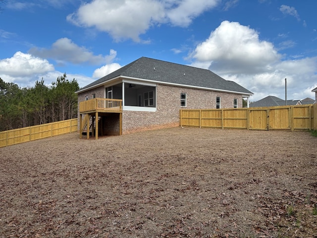 rear view of house with a sunroom