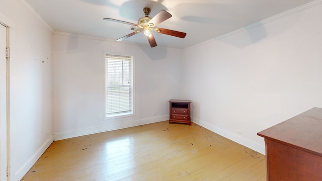 unfurnished room featuring crown molding, light hardwood / wood-style floors, and ceiling fan