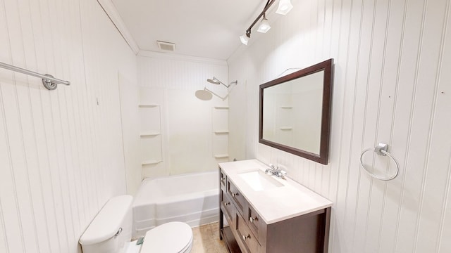 full bathroom featuring vanity, crown molding, washtub / shower combination, and toilet