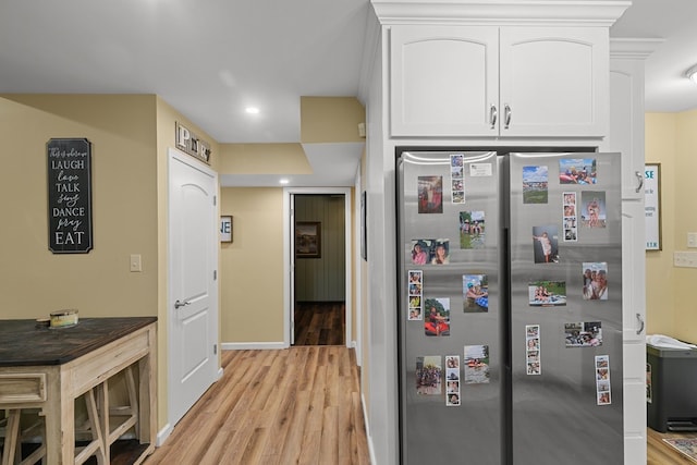 8165 County Road 97, Abbeville, AL 36310 - hallway featuring light wood-style flooring, baseboards, and recessed lighting