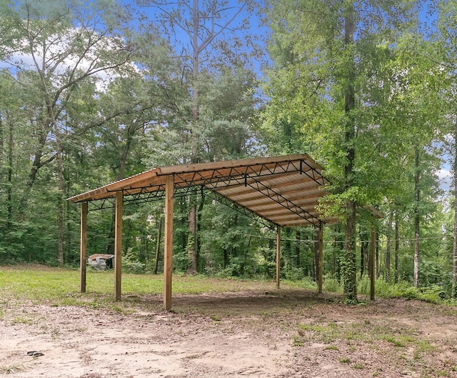8165 County Road 97, Abbeville, AL 36310 - surrounding community with a carport, a forest view, and dirt driveway