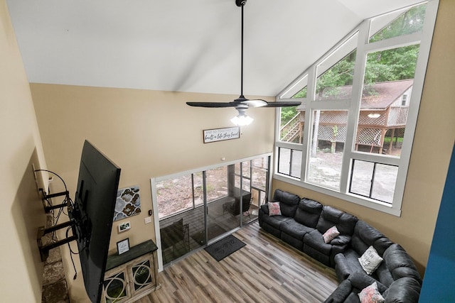 8165 County Road 97, Abbeville, AL 36310 - living room featuring high vaulted ceiling, wood finished floors, and a ceiling fan