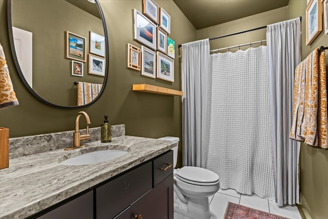 bathroom with tile patterned floors, toilet, a shower with curtain, and vanity
