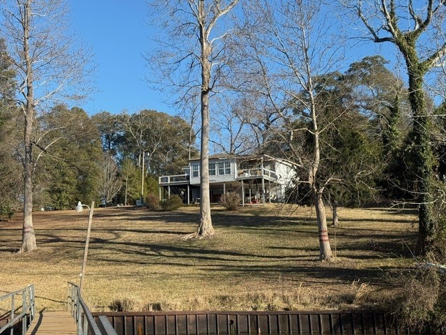 view of yard featuring a wooden deck