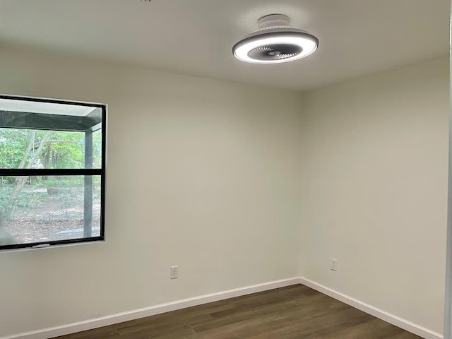 601 Melody Ln, Dothan, AL 36301 - spare room with baseboards and dark wood-style floors