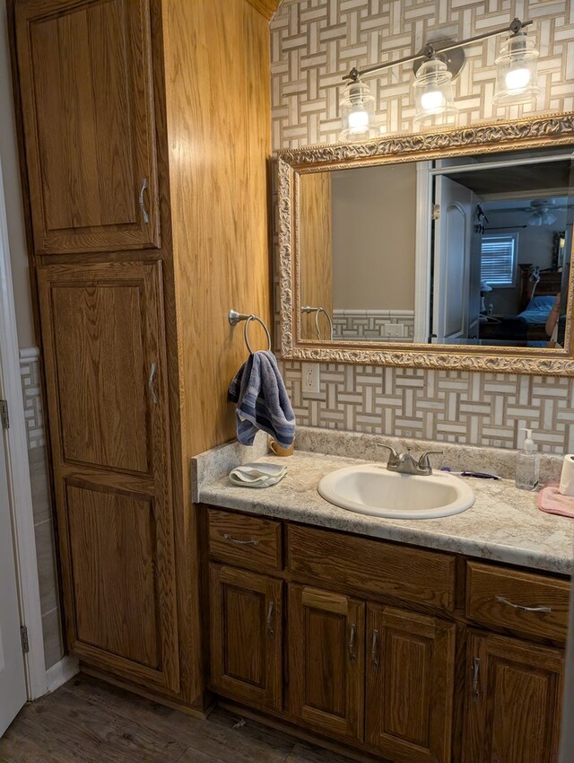 2302 Stonebridge Rd, Dothan, AL 36301 - bathroom featuring vanity and decorative backsplash
