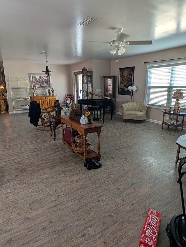 2302 Stonebridge Rd, Dothan, AL 36301 - living room with ceiling fan, wood finished floors, and baseboards