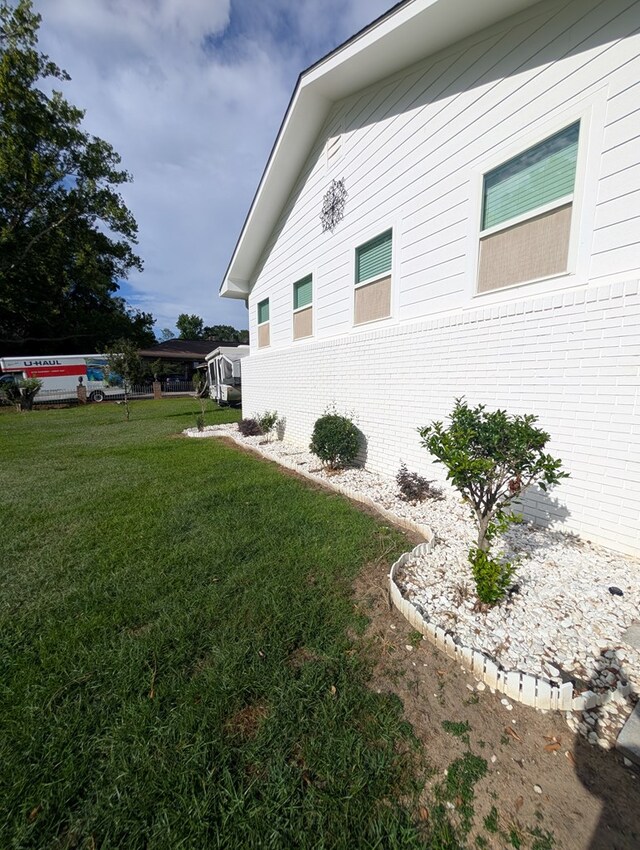 2302 Stonebridge Rd, Dothan, AL 36301 - view of property exterior featuring a yard