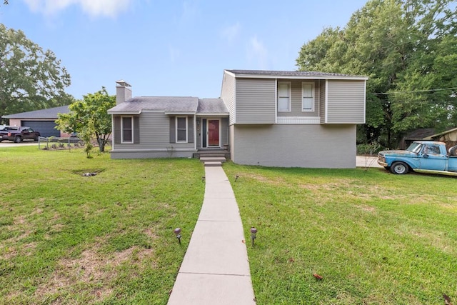 view of front of home with a front yard