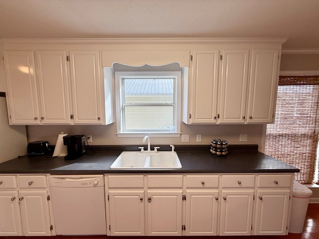 683 B Calhoun Dr, Abbeville, AL 36310 - kitchen with dishwasher, dark countertops, and white cabinetry