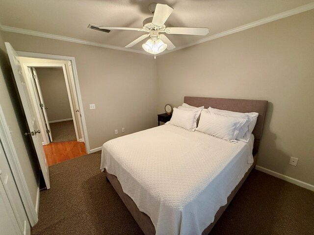 683 B Calhoun Dr, Abbeville, AL 36310 - bedroom featuring carpet flooring, crown molding, and ceiling fan