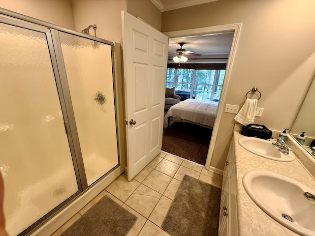 683 B Calhoun Dr, Abbeville, AL 36310 - bathroom featuring a shower stall, ensuite bath, tile patterned flooring, double vanity, and crown molding