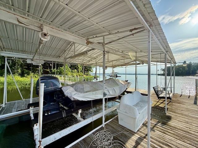 683 B Calhoun Dr, Abbeville, AL 36310 - dock area featuring boat lift and a water view
