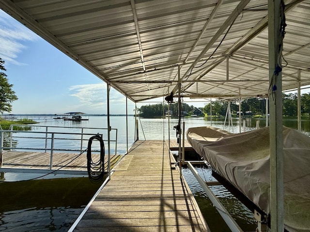 683 B Calhoun Dr, Abbeville, AL 36310 - dock featuring boat lift and a water view