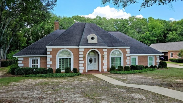 6 Woodmere Dr, Dothan, AL 36305 - view of front of property with brick siding, a chimney, and roof with shingles