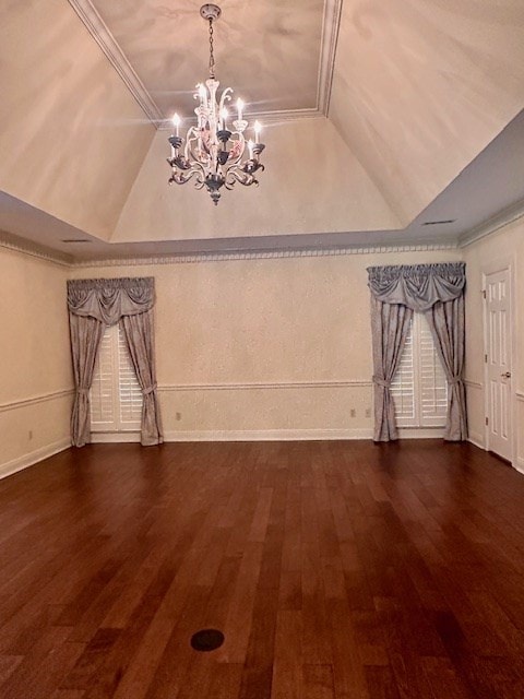 6 Woodmere Dr, Dothan, AL 36305 - unfurnished living room with a chandelier, wood finished floors, crown molding, a tray ceiling, and lofted ceiling